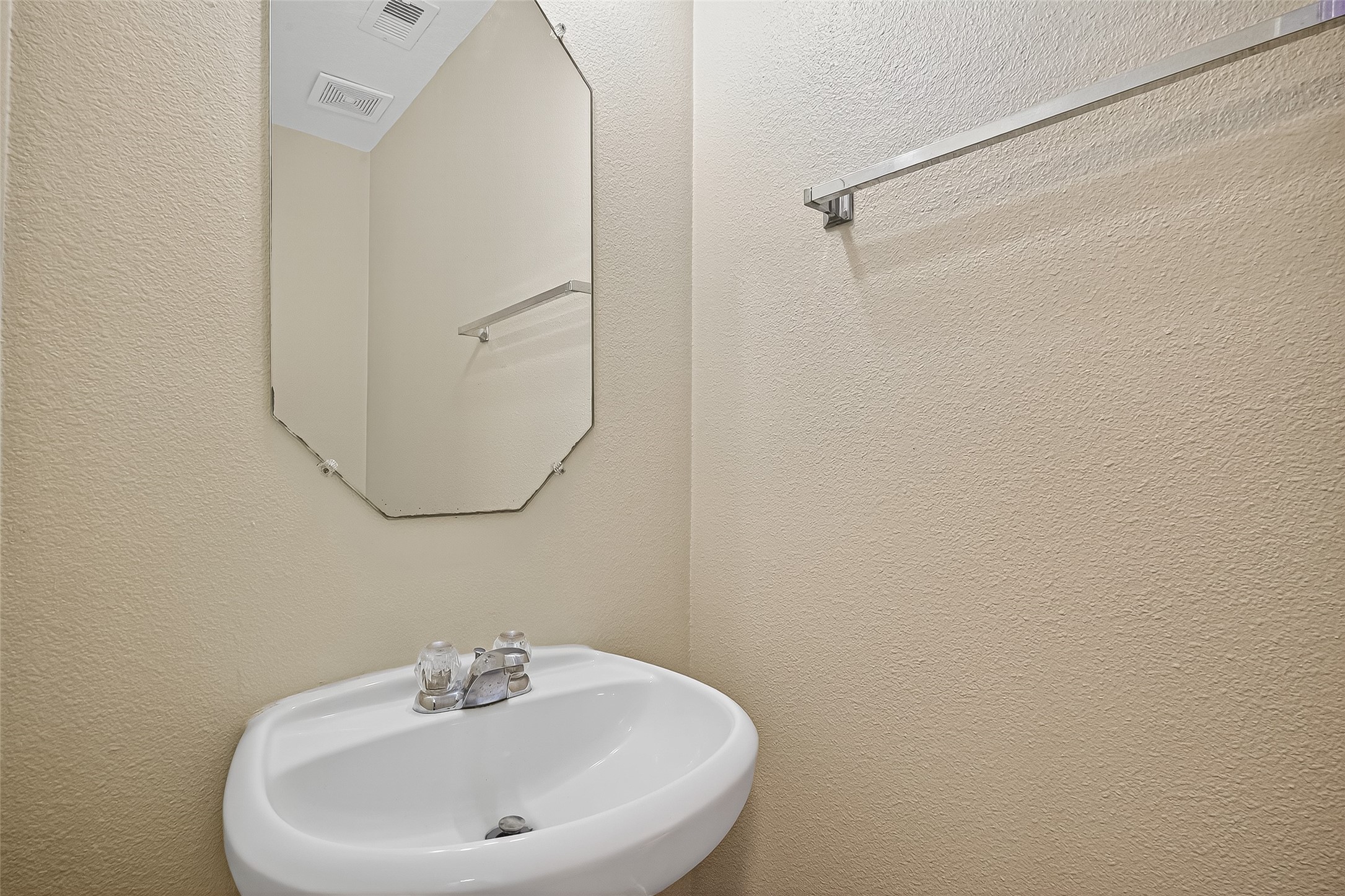 6343 Settlers Square Lane Katy, TX 77449 - Photo 26 of 41 a bathroom with a sink a shower and a mirror