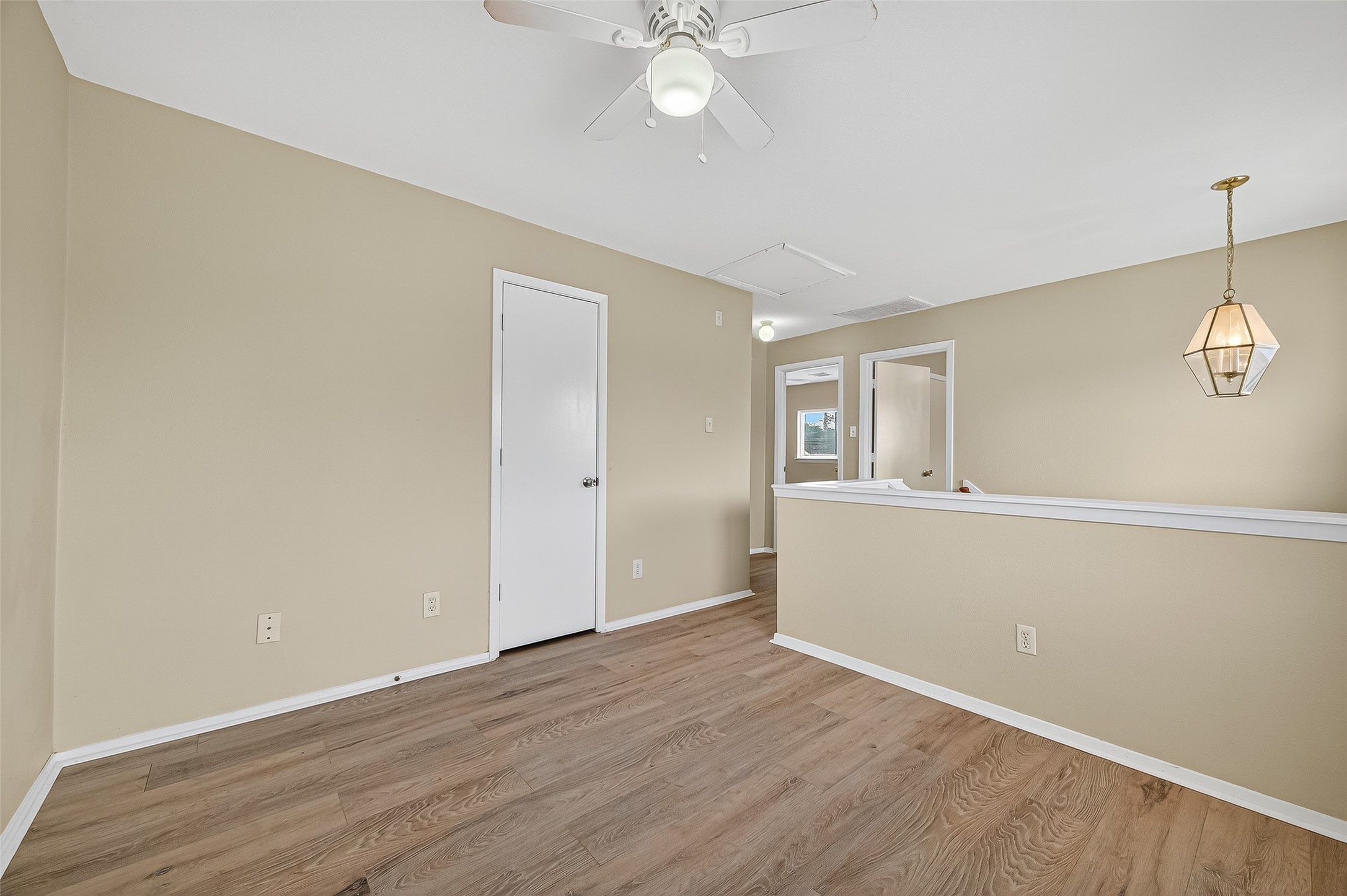 6343 Settlers Square Lane Katy, TX 77449 - Photo 29 of 41 wooden floor in an empty room with a window