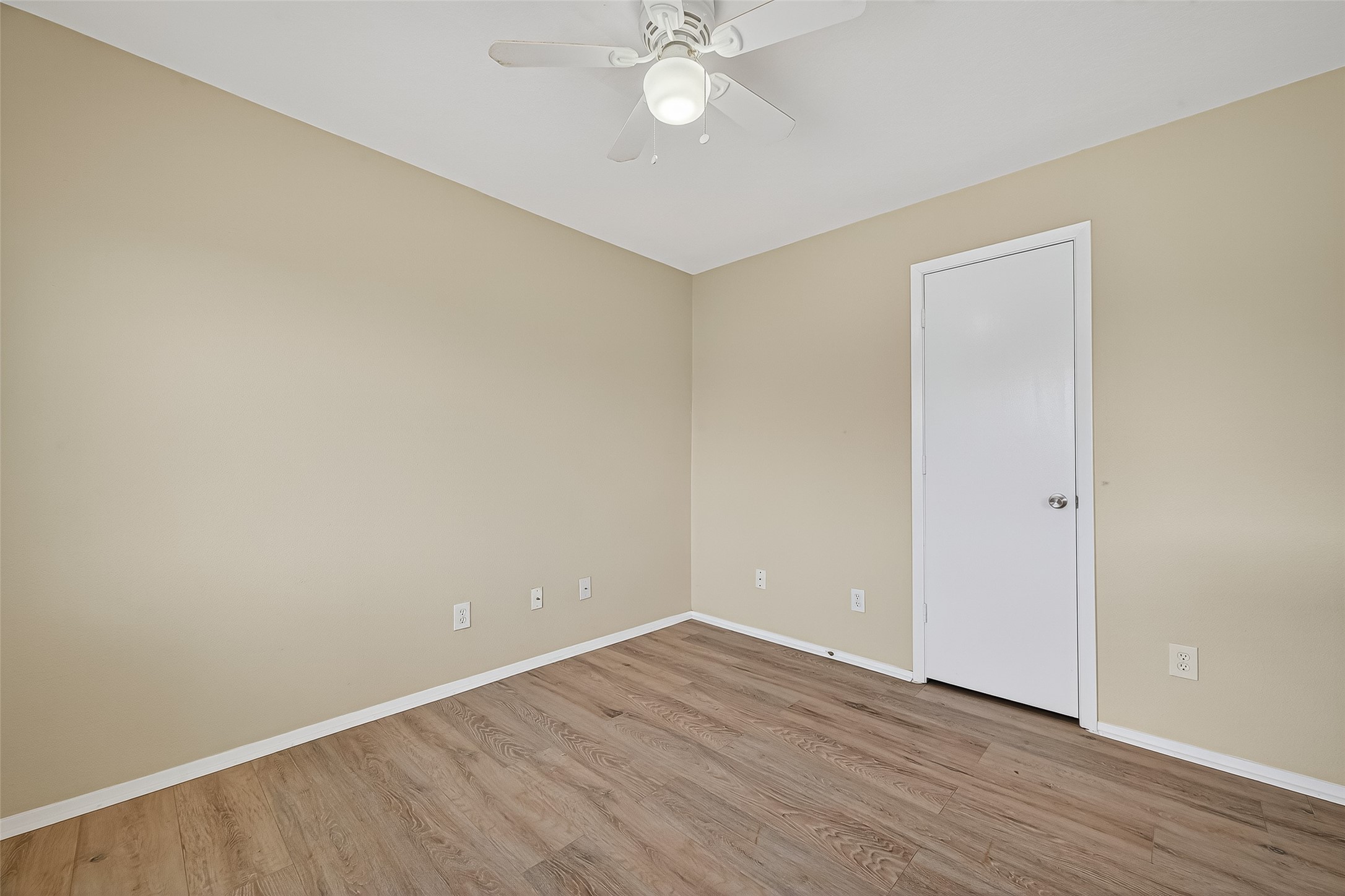 6343 Settlers Square Lane Katy, TX 77449 - Photo 30 of 41 a view of an empty room with wooden floor