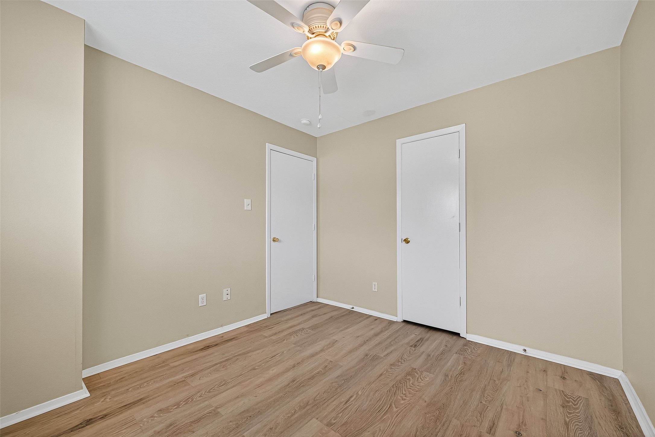6343 Settlers Square Lane Katy, TX 77449 - Photo 32 of 41 a view of an empty room with window and wooden floor