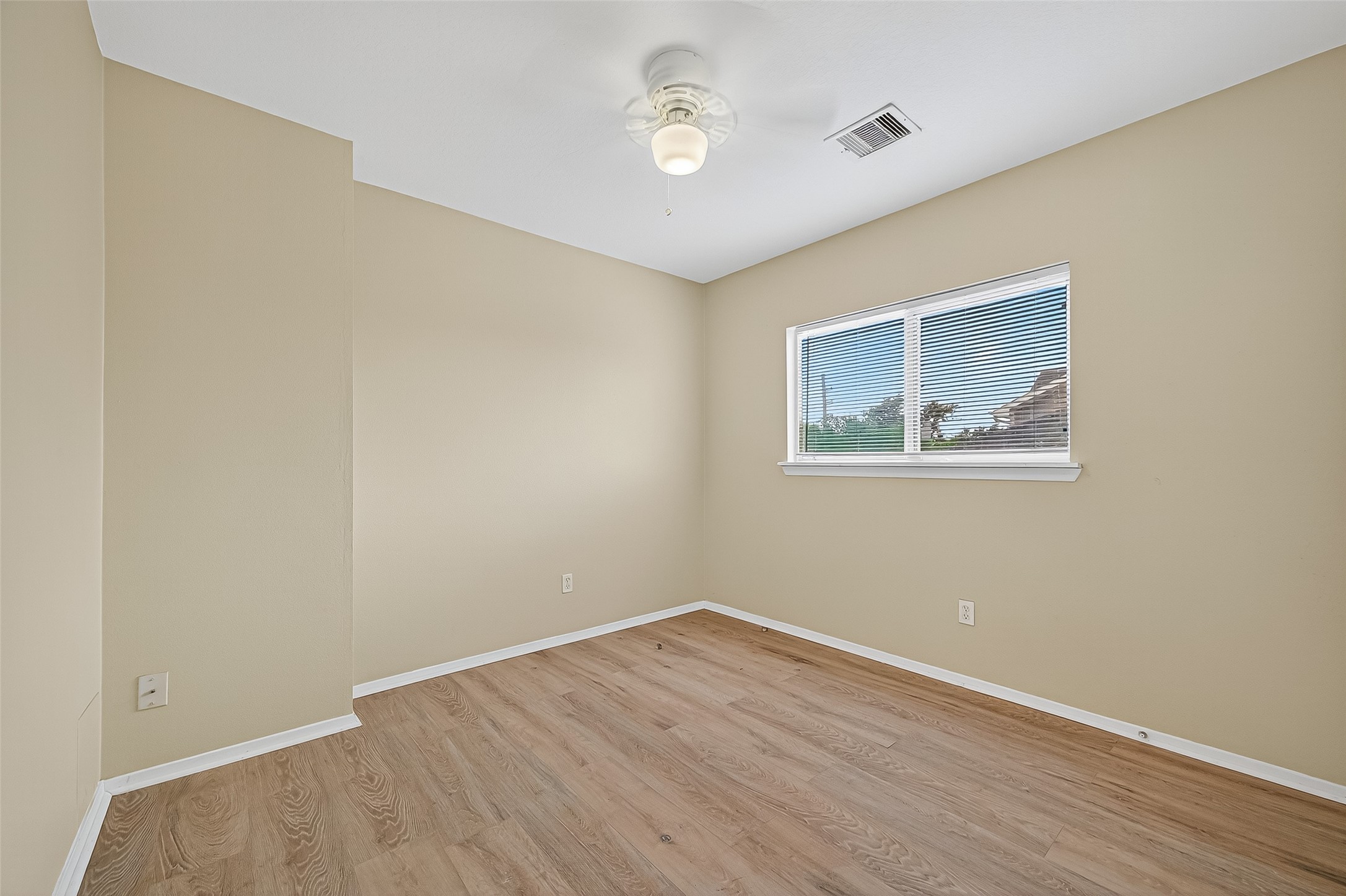 6343 Settlers Square Lane Katy, TX 77449 - Photo 33 of 41 a view of an empty room with wooden floor