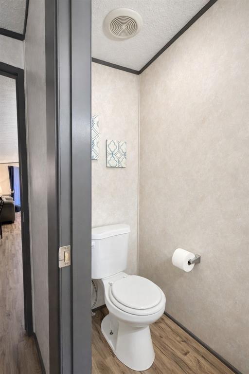 112 Rising Star Quitman, TX 75783 - Photo 14 of 39 a bathroom with a toilet and a shower