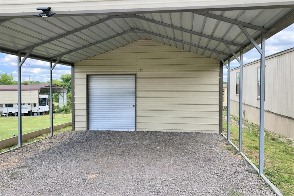 112 Rising Star Quitman, TX 75783 - Photo 2 of 39 a view of backyard with small cabin