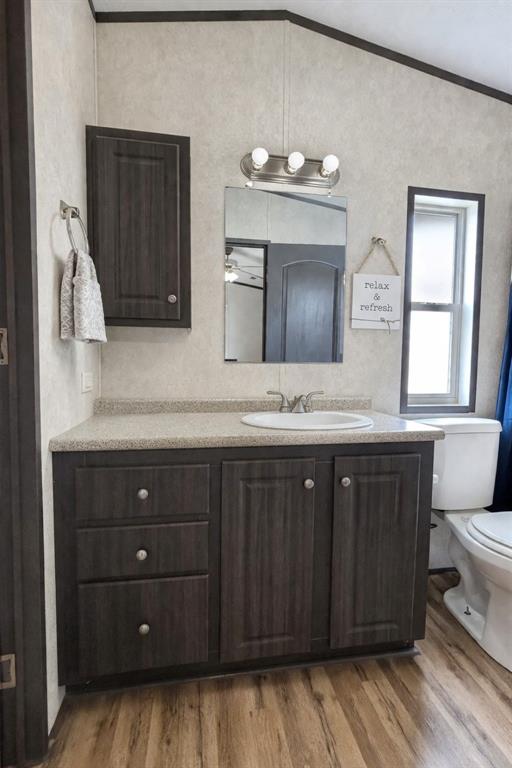 112 Rising Star Quitman, TX 75783 - Photo 24 of 39 a bathroom with a granite countertop double vanity sink and mirror