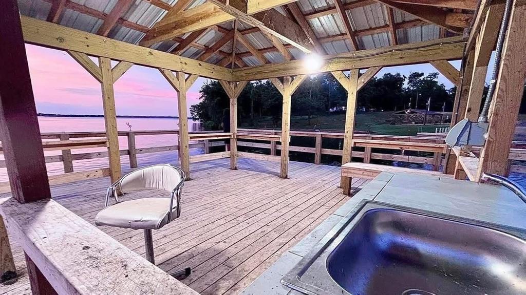 112 Rising Star Quitman, TX 75783 - Photo 37 of 39 a view of a chairs and table in the patio