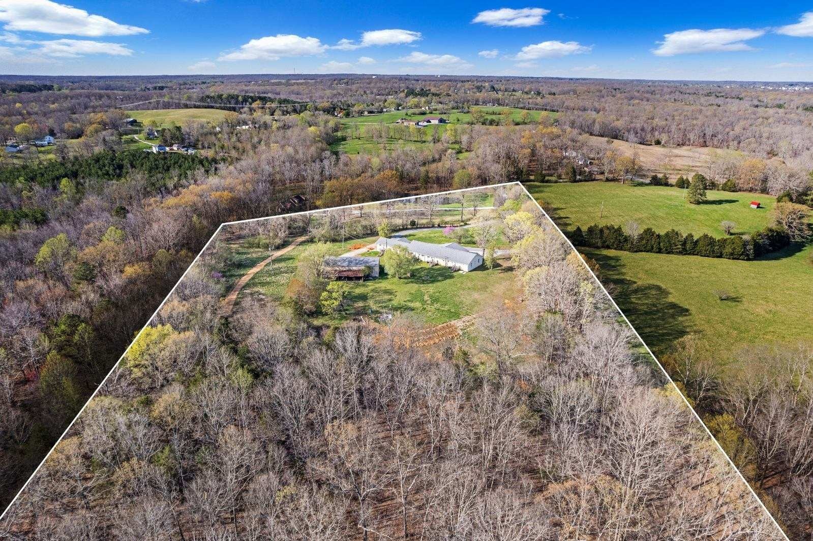 151 Covington Lane Dickson, TN 37055 - Photo 26 of 27 a view of a yard with an outdoor seating