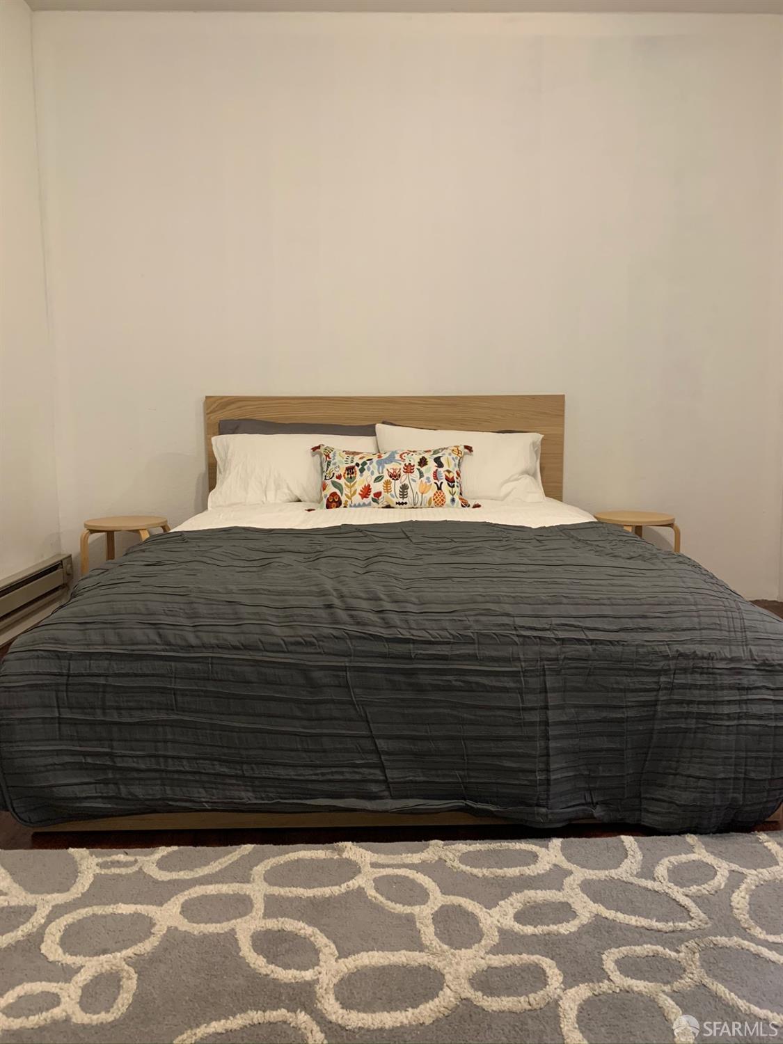 201 Harrison Street, Unit 129 San Francisco, CA 94105 - Photo 4 of 19 a black and white photo of a black white wall