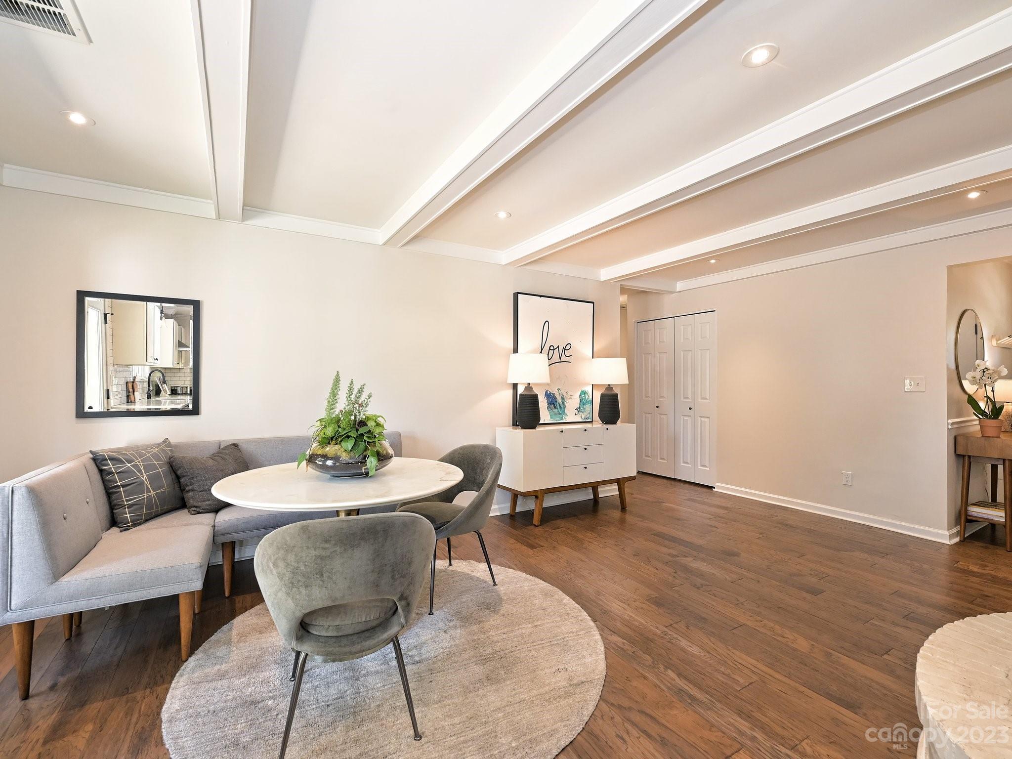 101 Scofield Road Charlotte, NC 28209 - Photo 12 of 26 a living room with furniture and a wooden floor