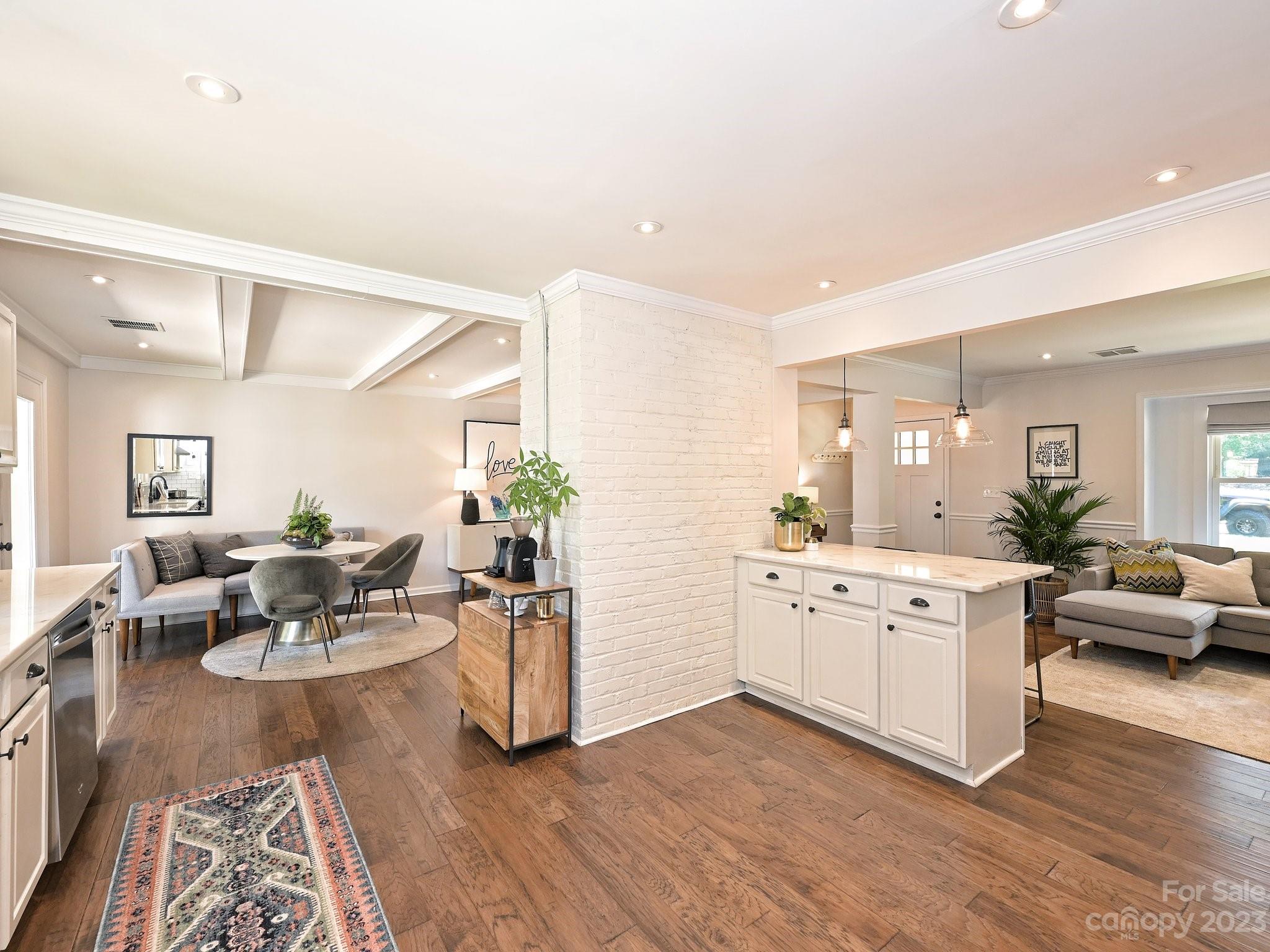 101 Scofield Road Charlotte, NC 28209 - Photo 9 of 26 a living room with furniture and wooden floor