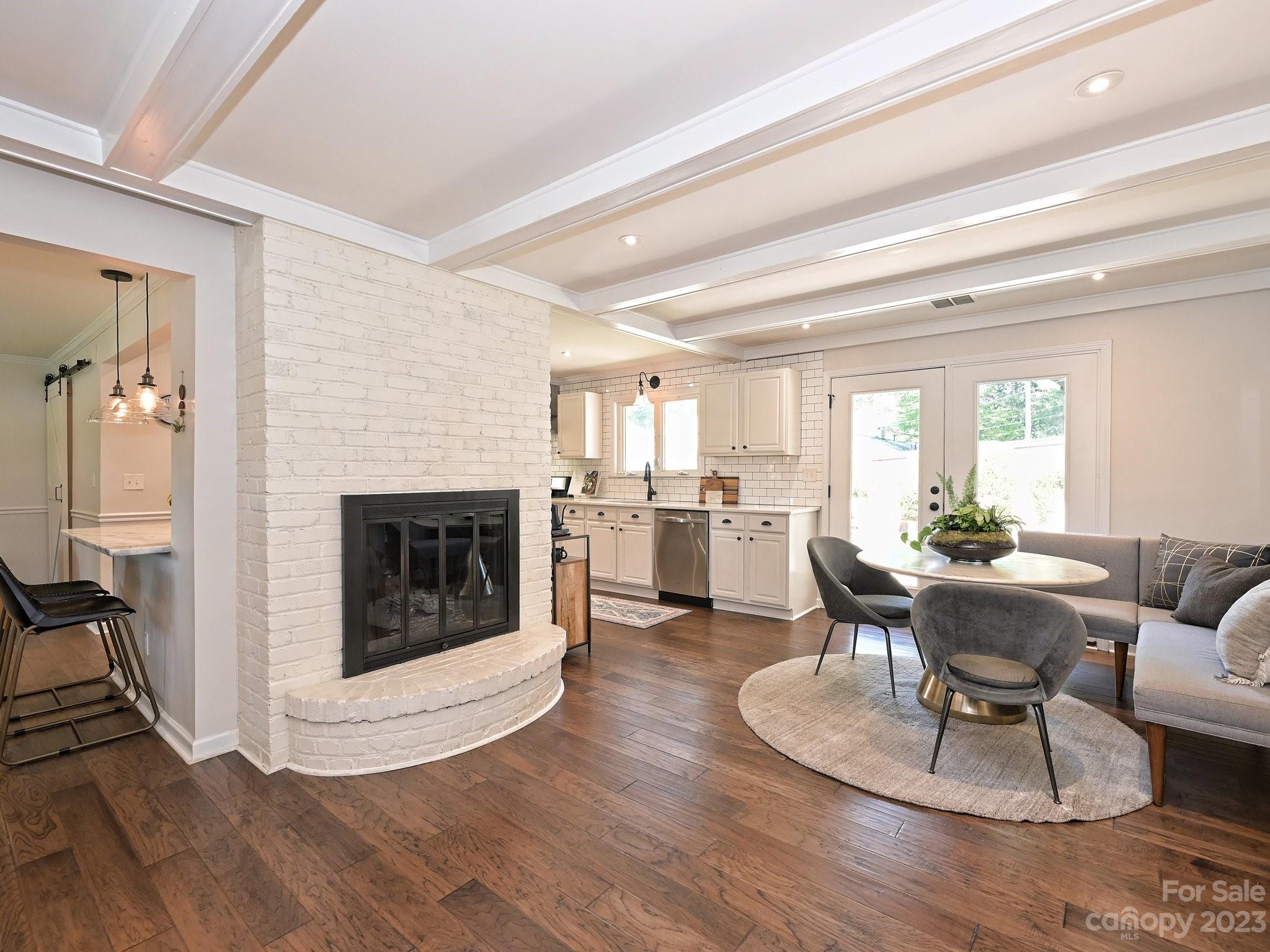 101 Scofield Road Charlotte, NC 28209 - Photo 10 of 26 a living room with furniture and a fireplace