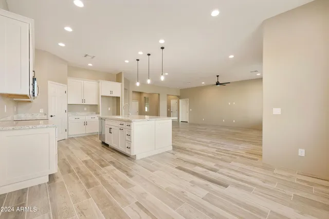 a en suite bathroom with double sink and a mirror