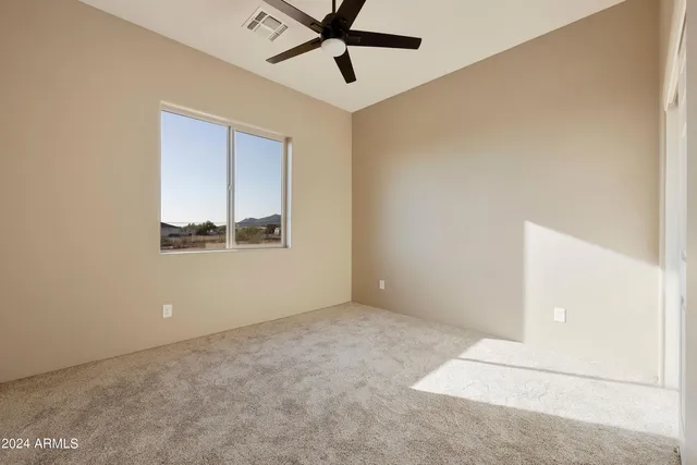 a view of a backyard of the house