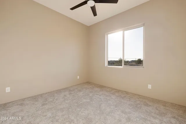 a view of a livingroom with a window