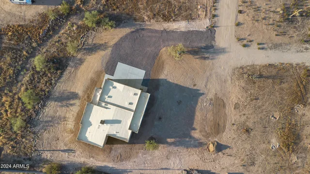 a view of a road with an ocean view