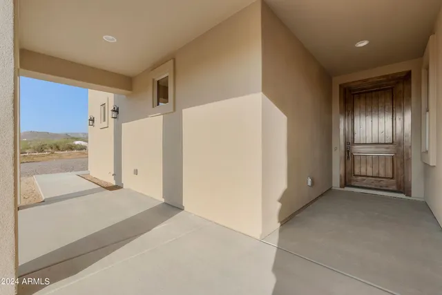a kitchen with a sink and chandelier