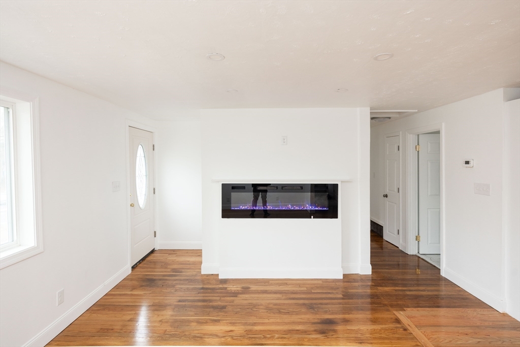 155 Southbridge Road Oxford, MA 01537 - Photo 11 of 42 a view of a livingroom with wooden floor