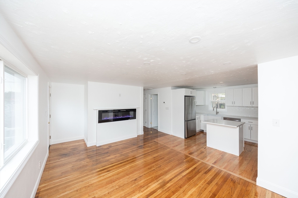 155 Southbridge Road Oxford, MA 01537 - Photo 13 of 42 a view of a kitchen with a sink and a refrigerator