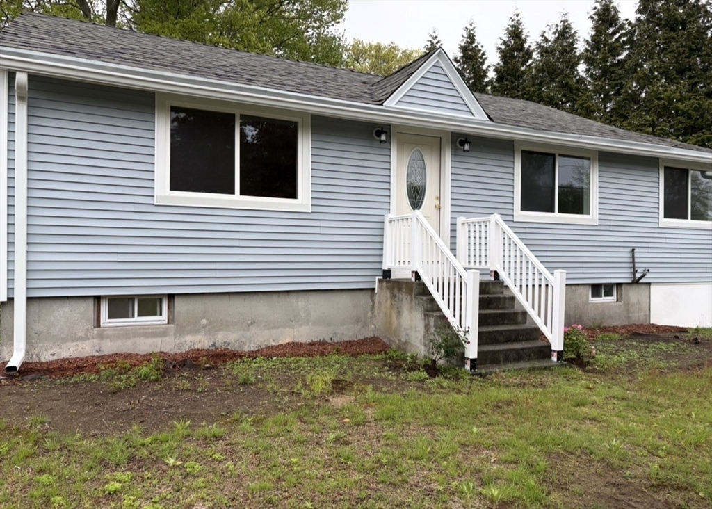 155 Southbridge Road Oxford, MA 01537 - Photo 2 of 42 a view of a house with a yard