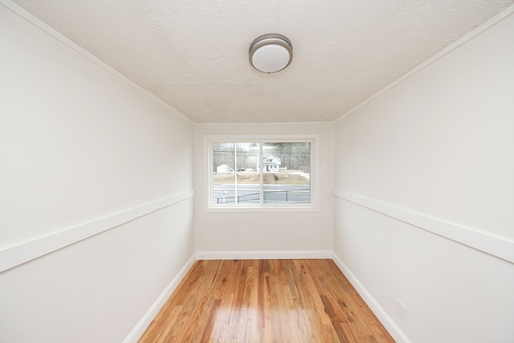 155 Southbridge Road Oxford, MA 01537 - Photo 30 of 42 a view of a room with wooden floor and window