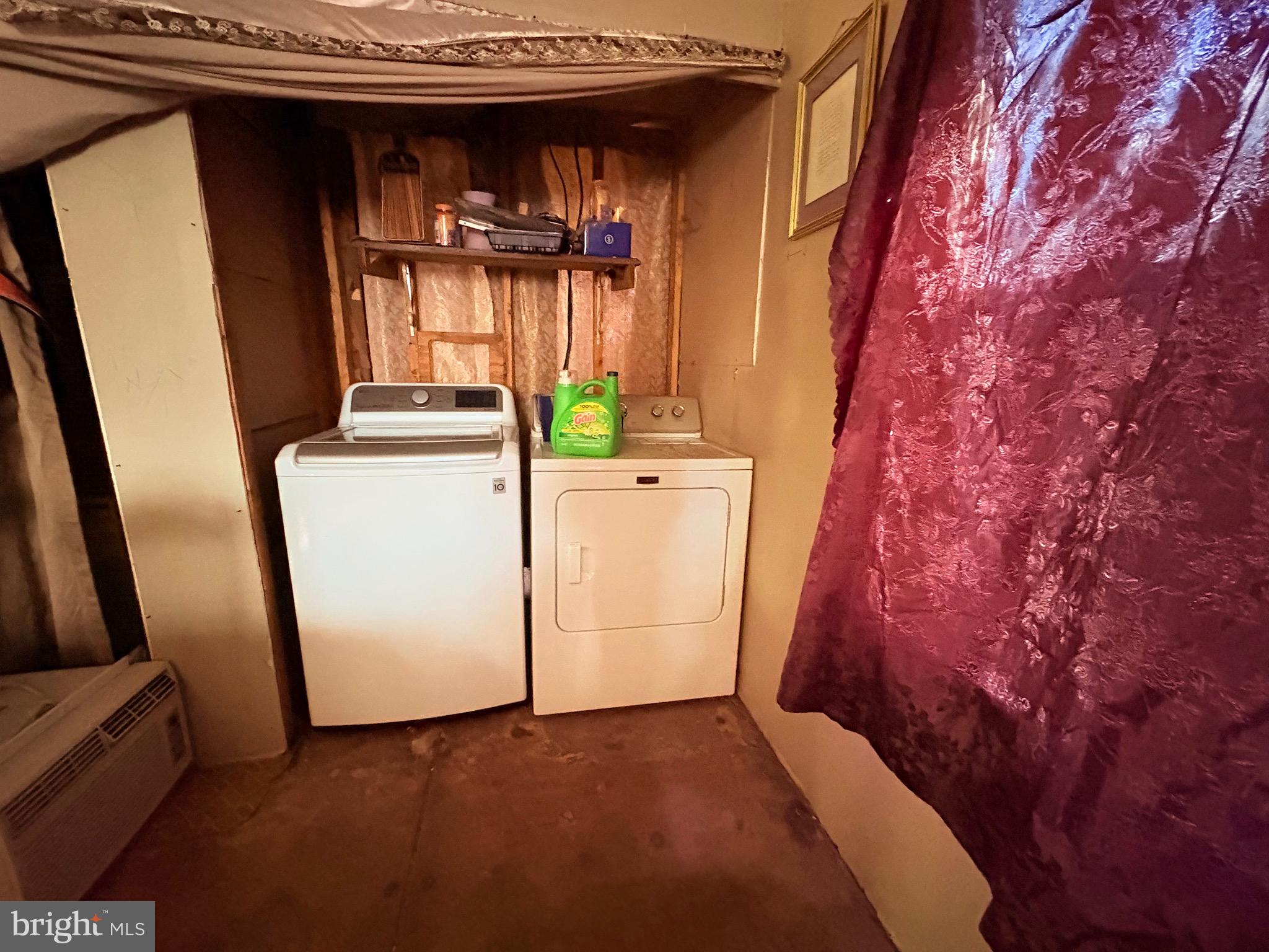 8385 Hurleys Neck Road Mardela Springs, MD 21837 - Photo 14 of 25 a view of hallway with washer and dryer