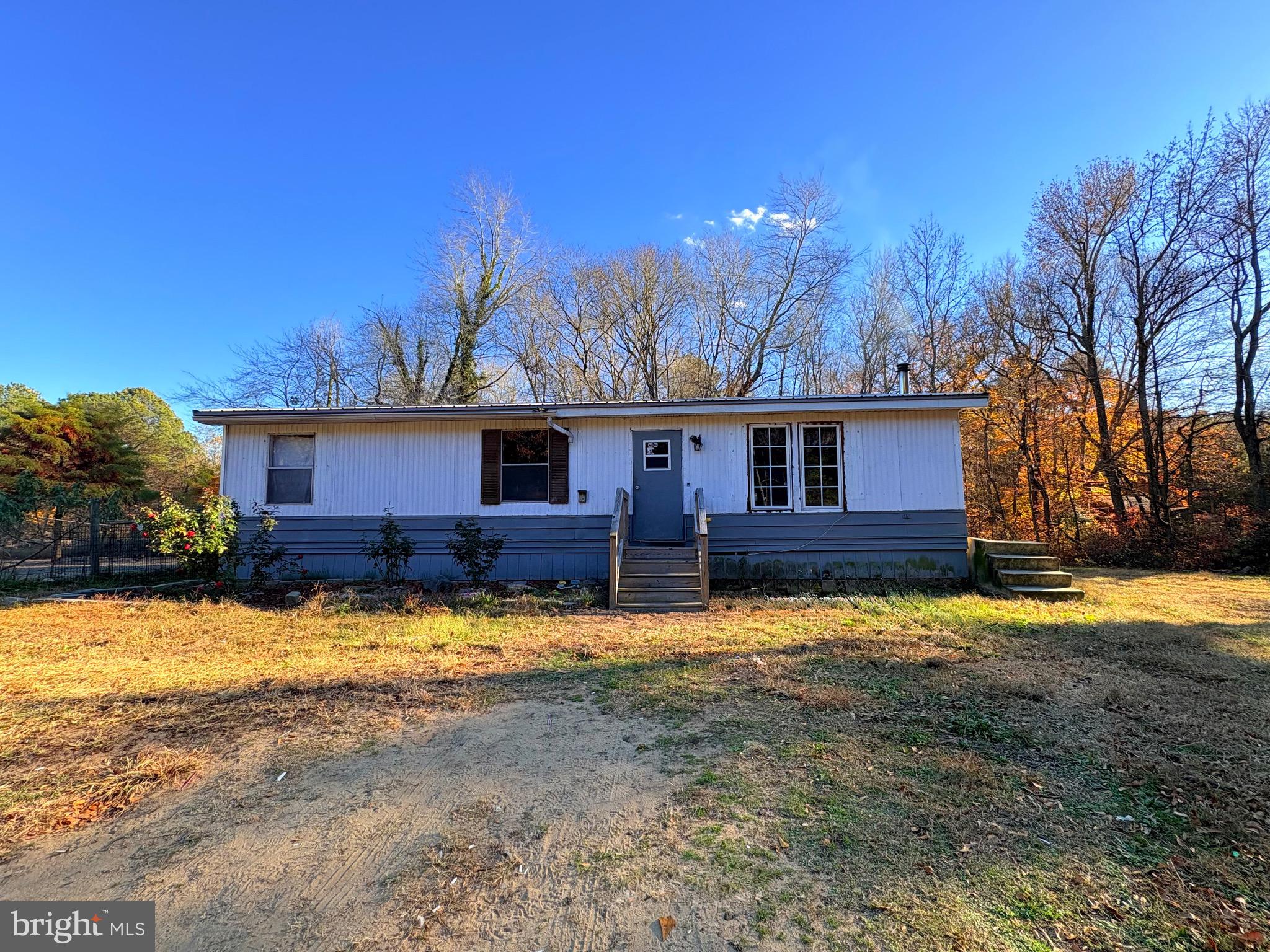 8385 Hurleys Neck Road Mardela Springs, MD 21837 - Photo 7 of 25 a view of a house with snow yard and covered with green space