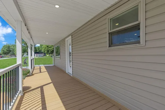 a view of a garden with large trees