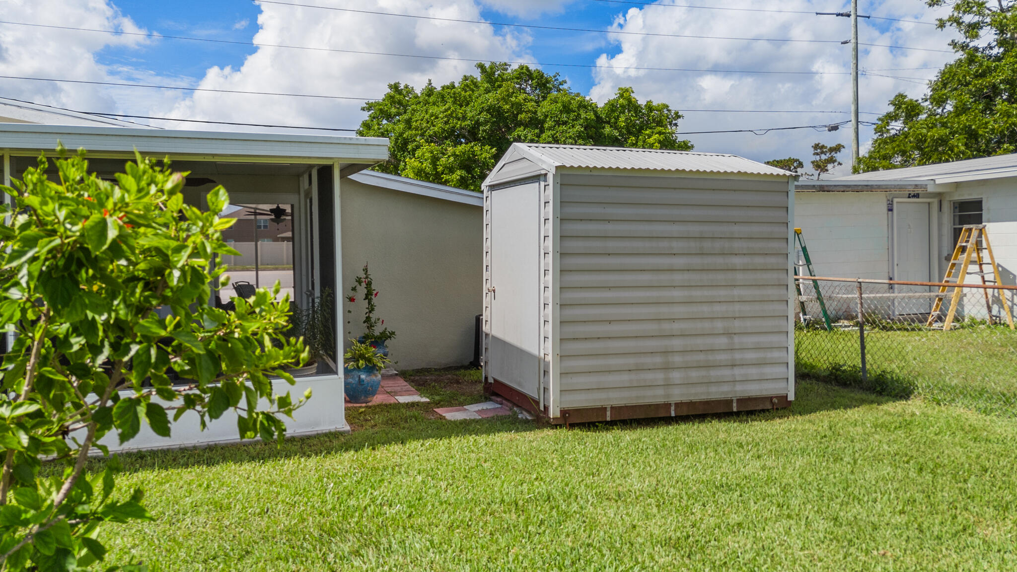 1972 Post Road Melbourne, FL 32935 - Photo 18 of 21 a view of a backyard with plants