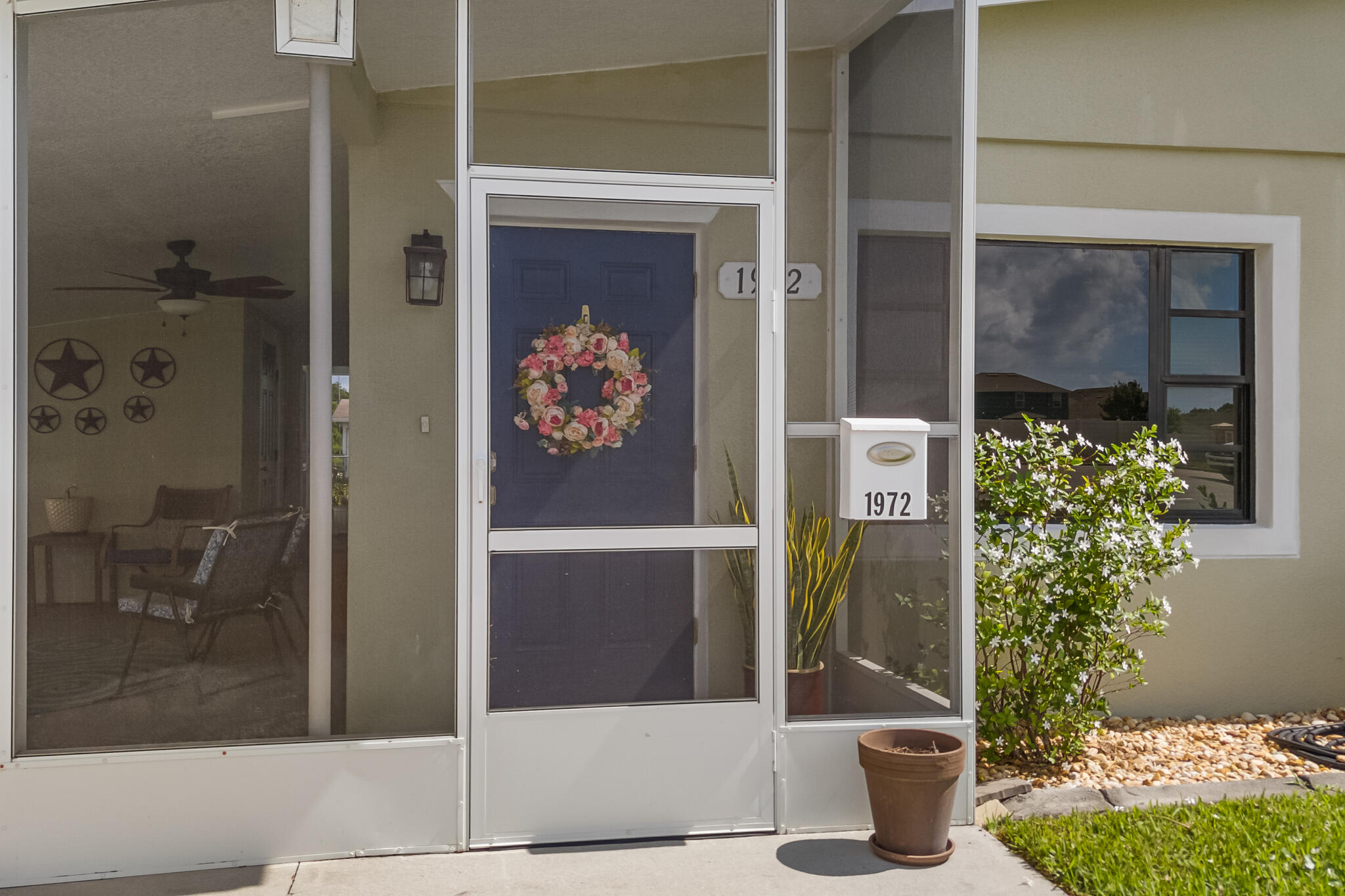 1972 Post Road Melbourne, FL 32935 - Photo 2 of 21 a view of a entryway door of the house