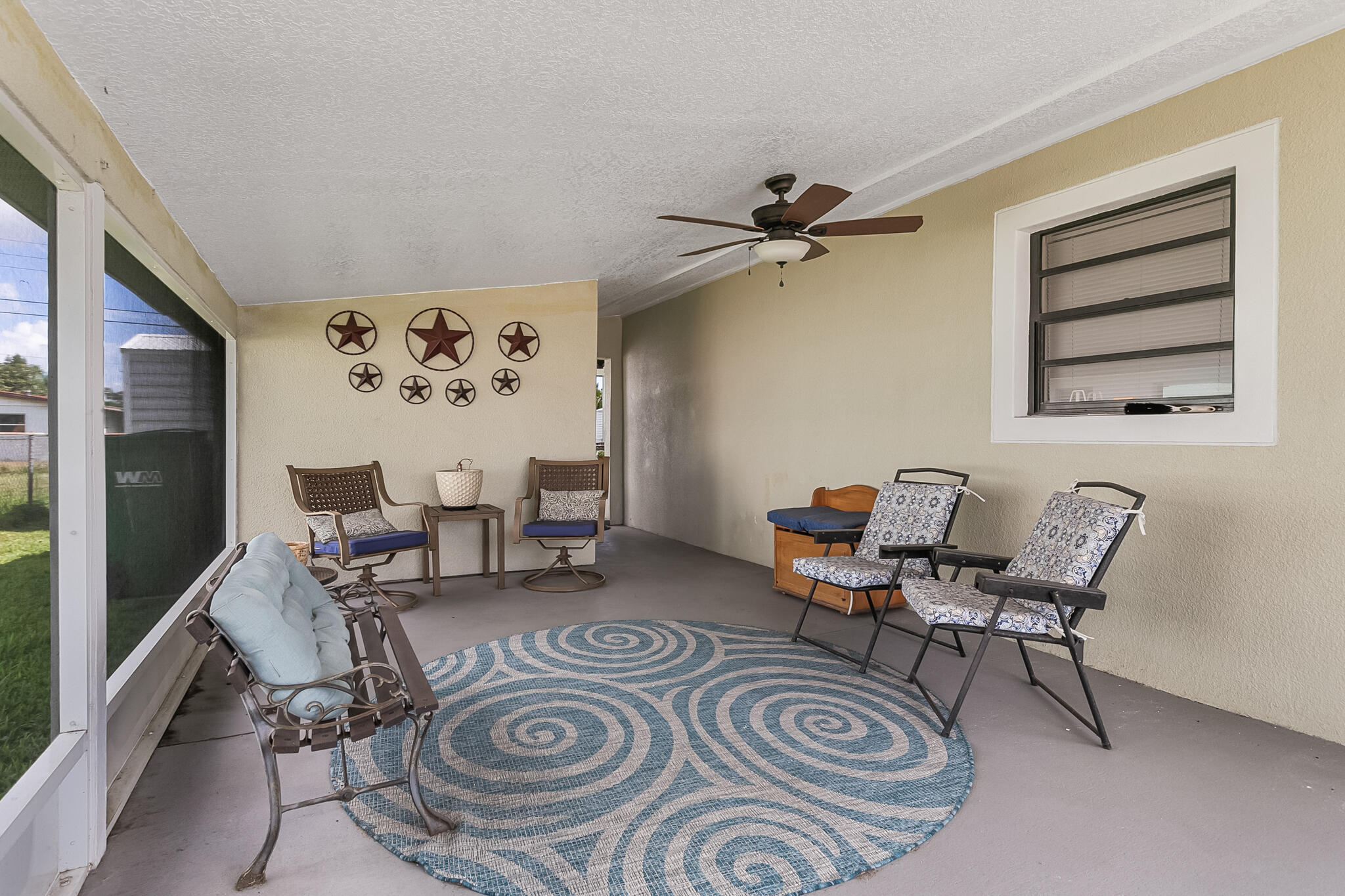 1972 Post Road Melbourne, FL 32935 - Photo 3 of 21 a view of a livingroom with furniture and a chair
