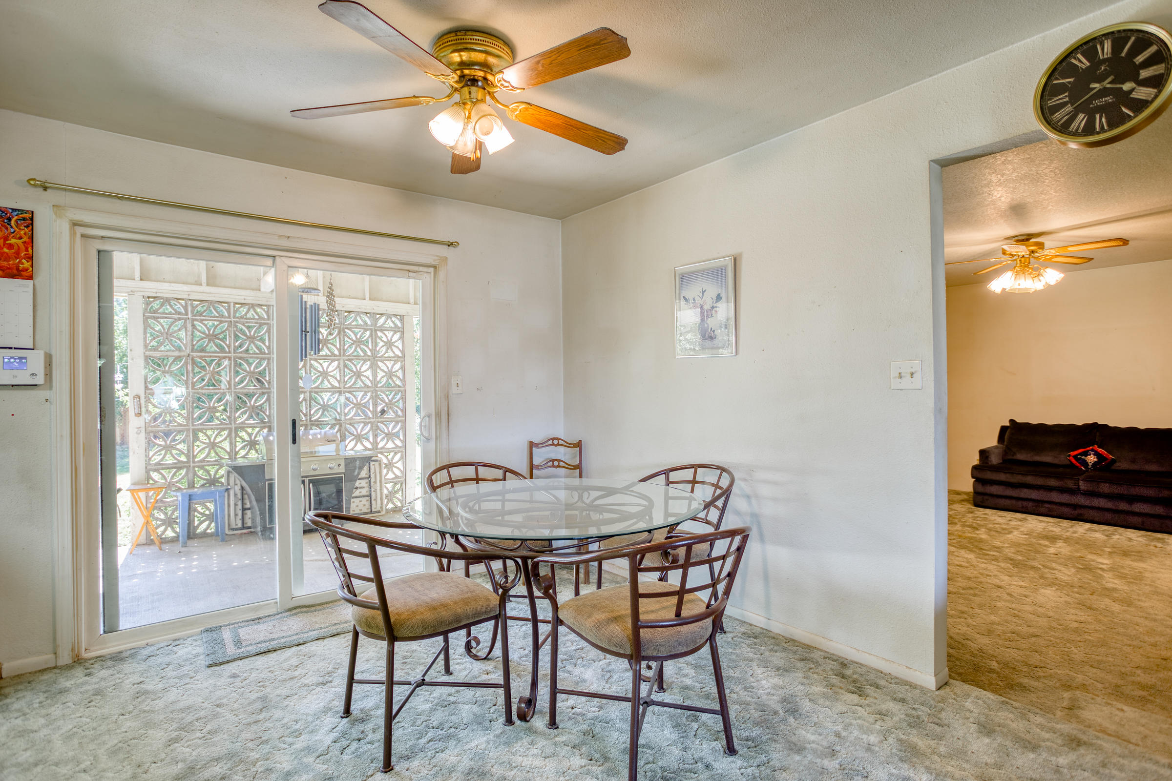 6762 Riverside Drive Redding, CA 96001 - Photo 26 of 39 Dining Area with Slider - Into Bonus Rm