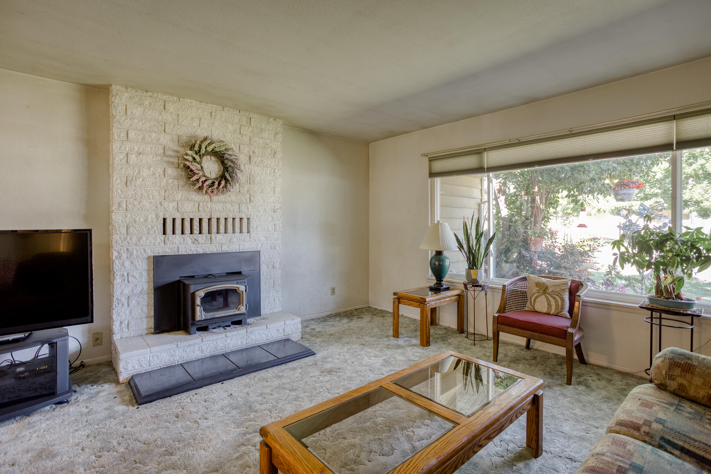 6762 Riverside Drive Redding, CA 96001 - Photo 3 of 39 Wood Stove in Living Room