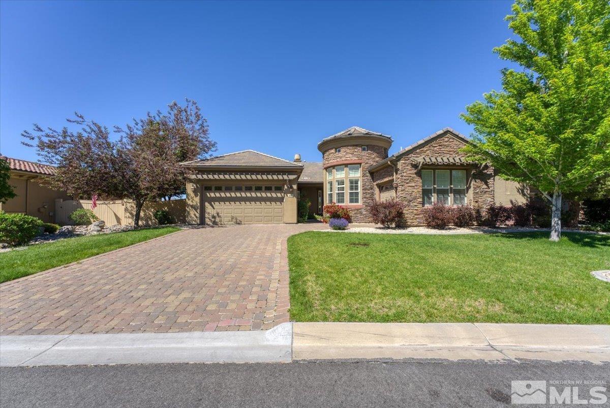 10145 Burghley Lane Reno, NV 89521 - Photo 1 of 31 a front view of a house with garden