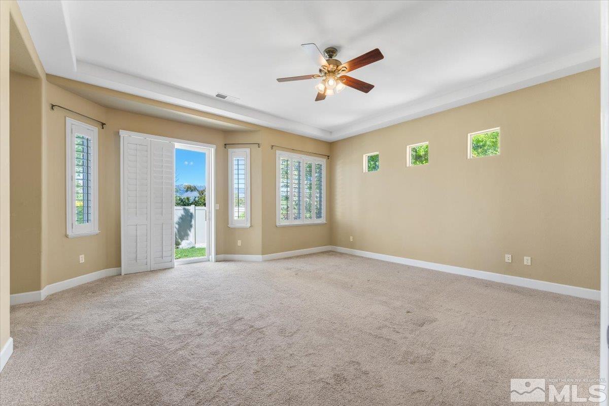 10145 Burghley Lane Reno, NV 89521 - Photo 14 of 31 a view of an empty room with window