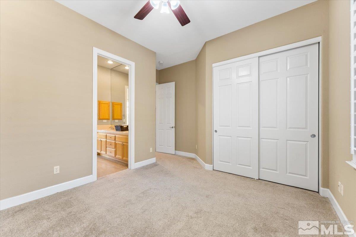 10145 Burghley Lane Reno, NV 89521 - Photo 23 of 31 an empty room with closet area
