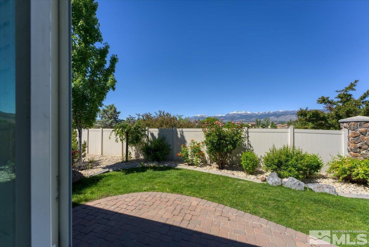 10145 Burghley Lane Reno, NV 89521 - Photo 26 of 31 a view of a yard with palm tree