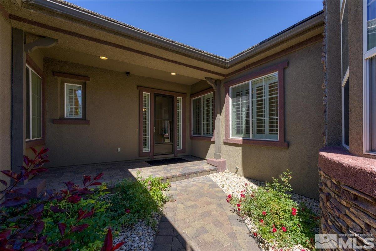 10145 Burghley Lane Reno, NV 89521 - Photo 4 of 31 a front view of a house
