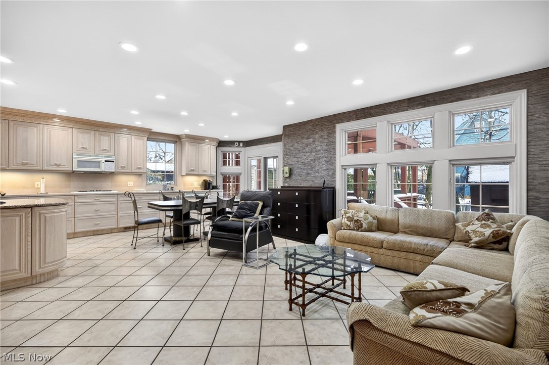 3498 Bainbridge Road Cleveland Heights, OH 44118 - Photo 21 of 50 Living room featuring light tile patterned floors and recessed lighting
