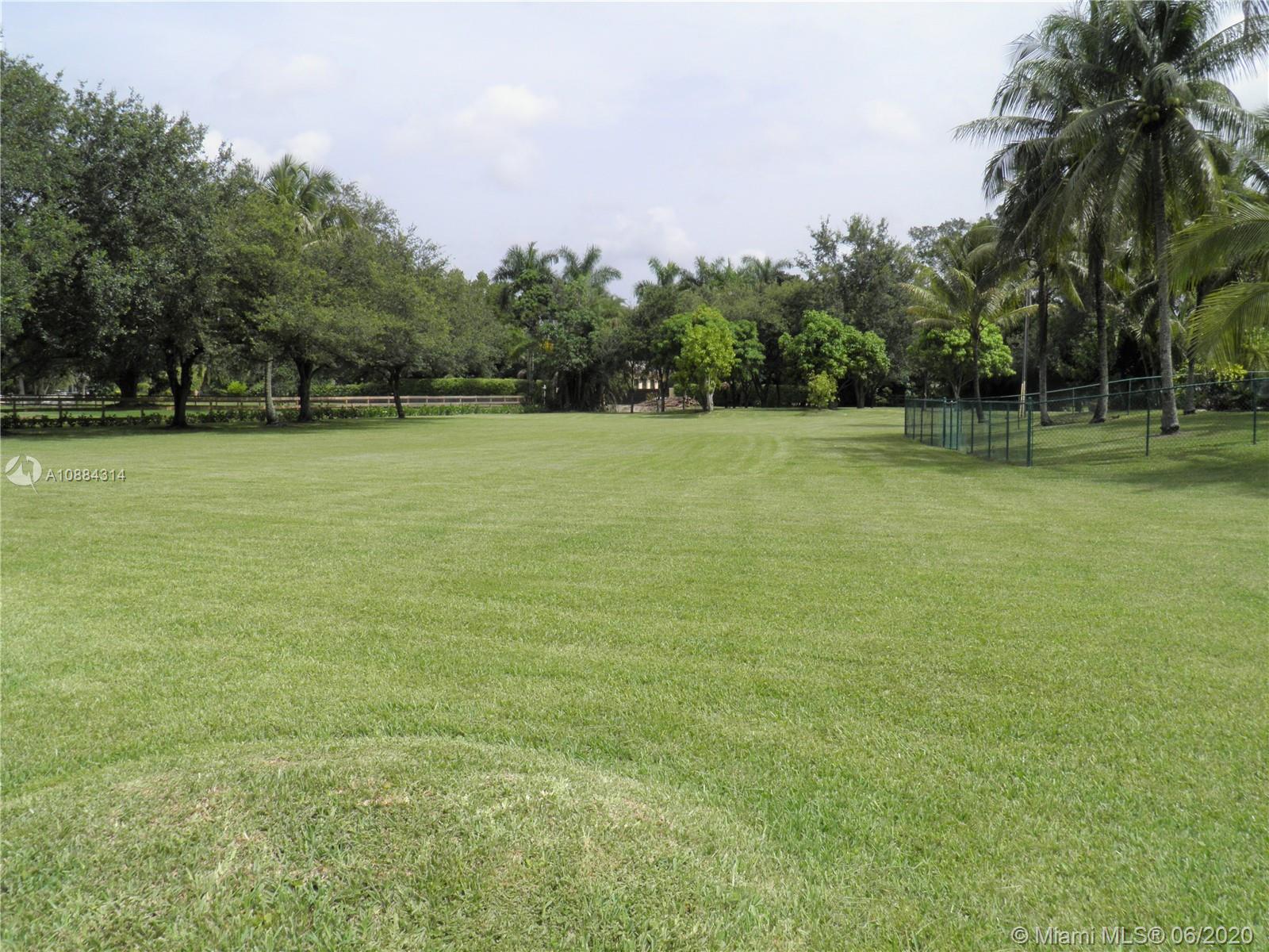 6311 Hancock Road Southwest Ranches, FL 33330 - Photo 21 of 23 a view of a field with trees