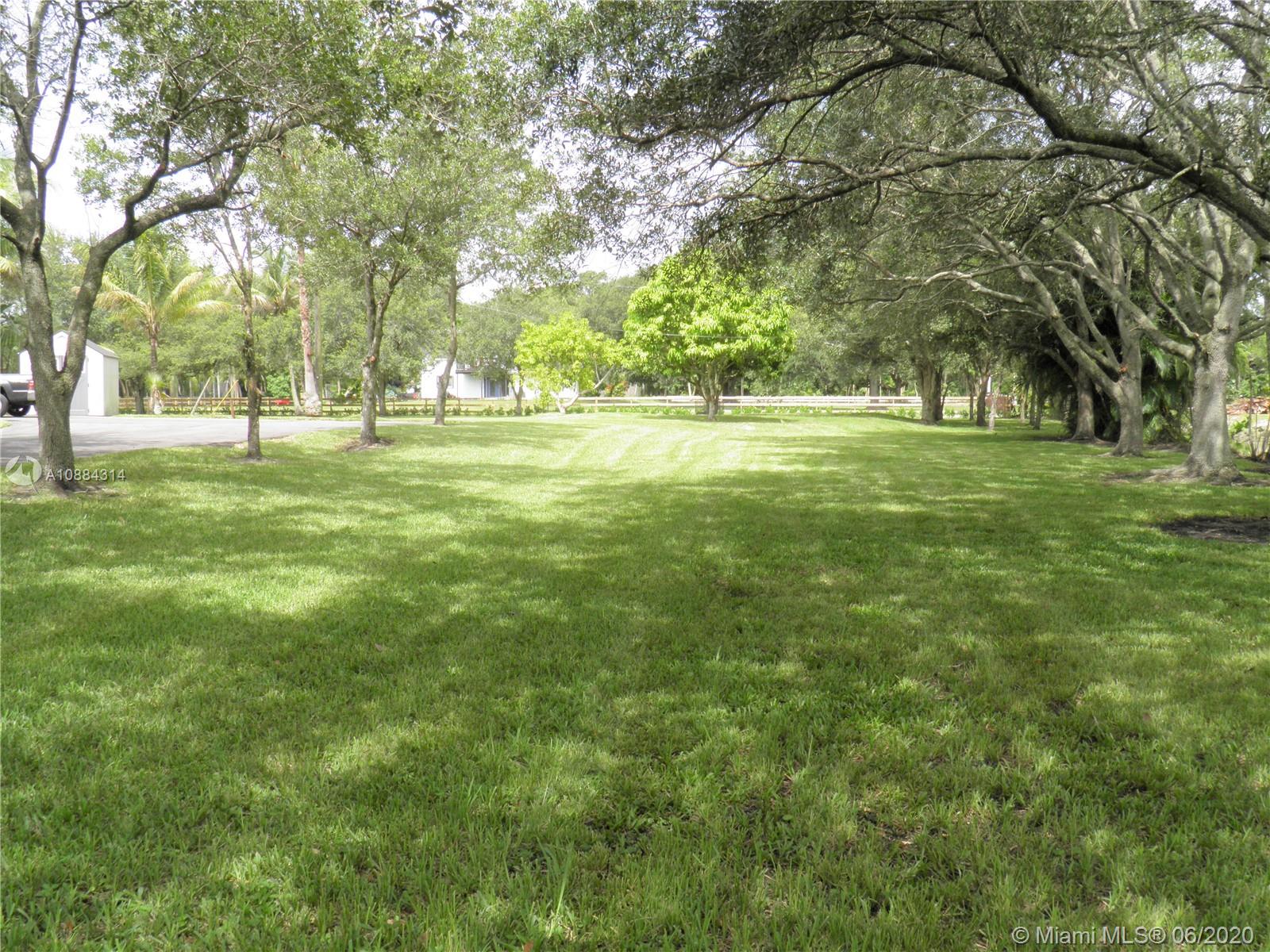 6311 Hancock Road Southwest Ranches, FL 33330 - Photo 4 of 23 a view of yard with trees