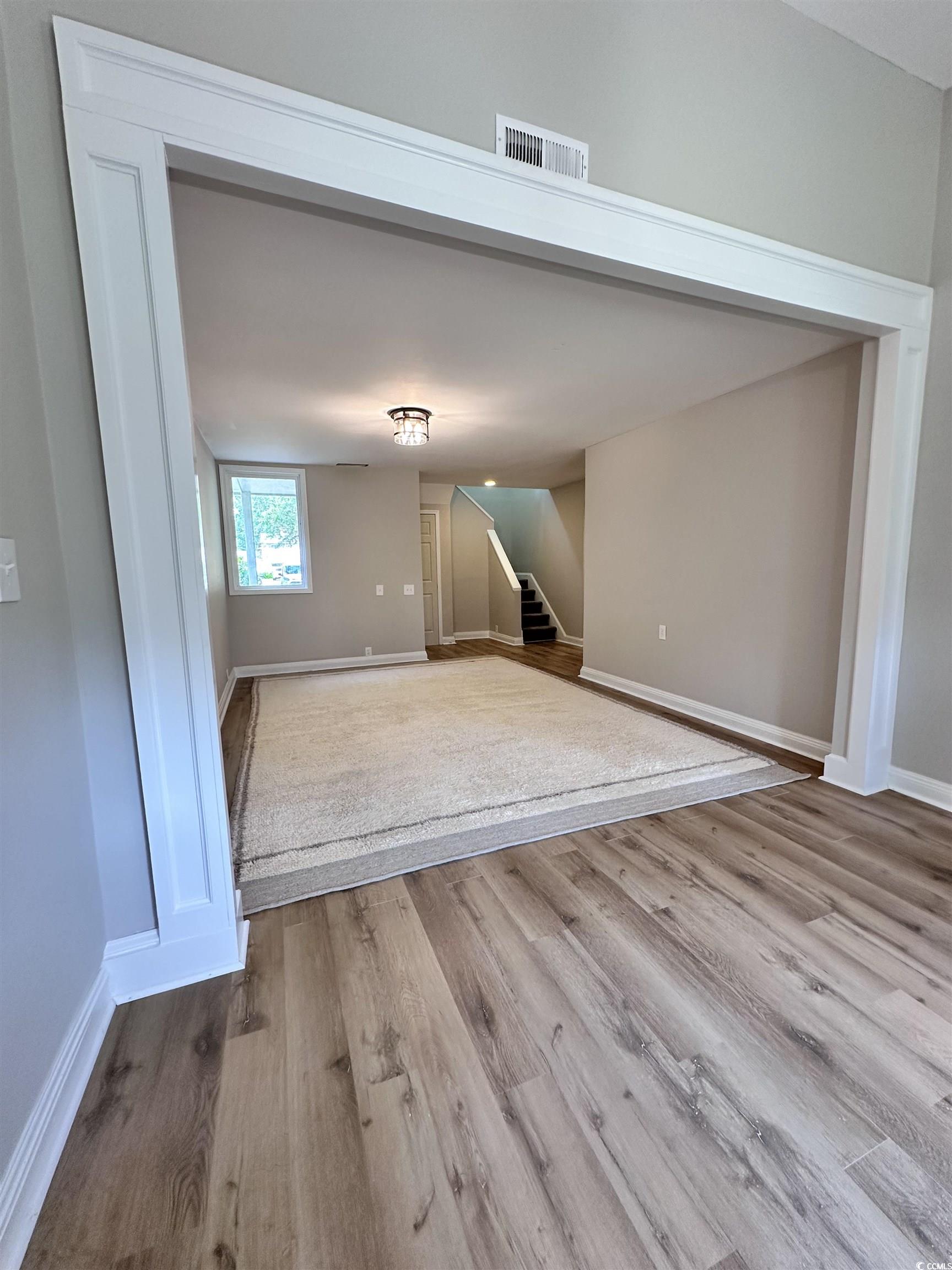 146 Wedgefield Village Road, Unit 26 Georgetown, SC 29440 - Photo 3 of 17 LIVING AND DINING AREA