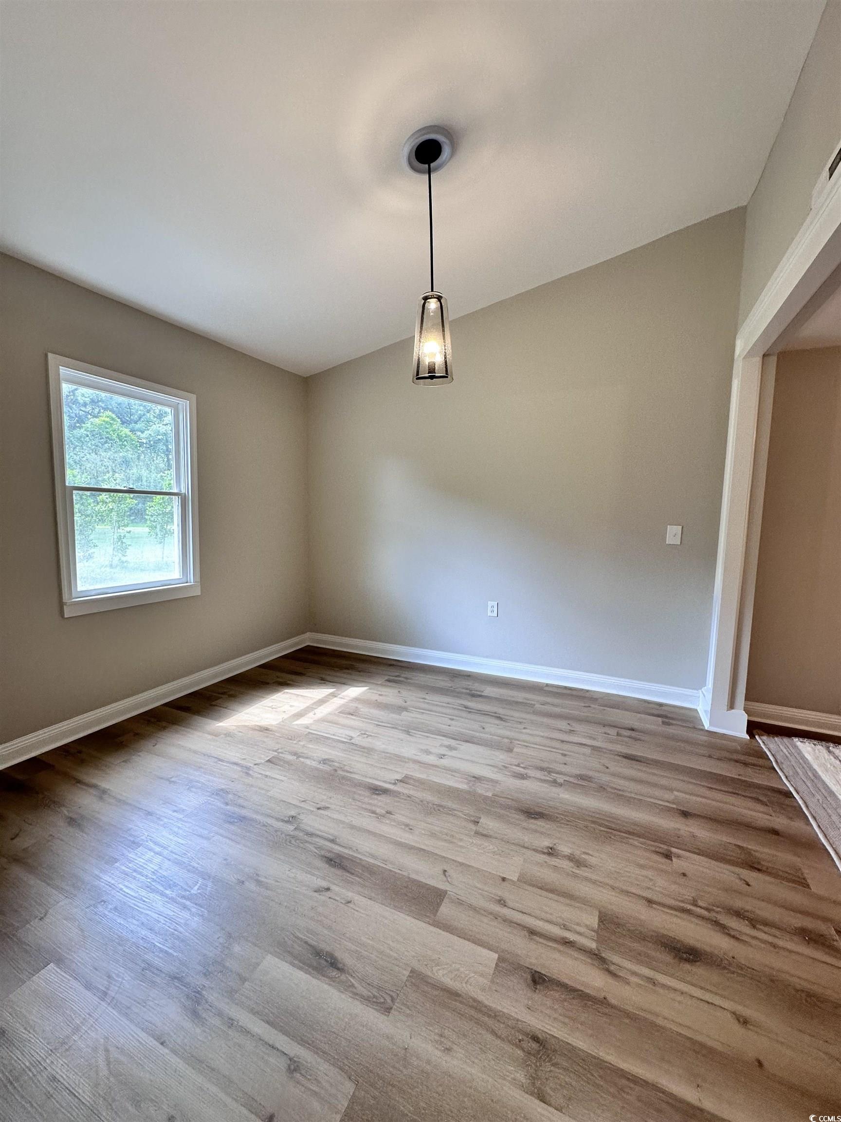 146 Wedgefield Village Road, Unit 26 Georgetown, SC 29440 - Photo 4 of 17 LIVING AND DINING AREA