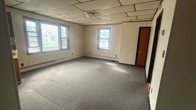 an empty room with windows