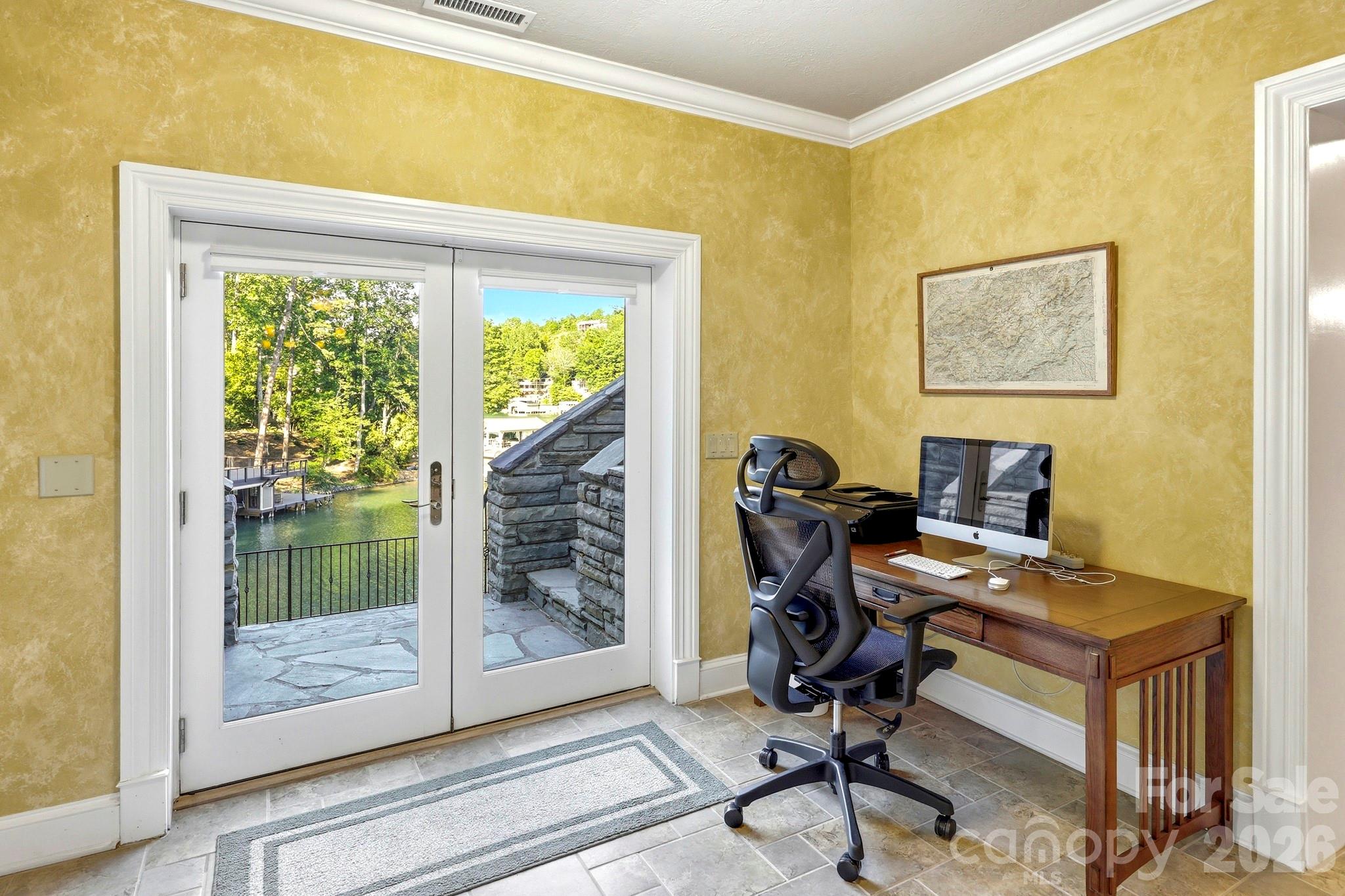 151 Garner Road Lake Lure, NC 28746 - Photo 29 of 48 a view of workspace with wooden floor windows and chair