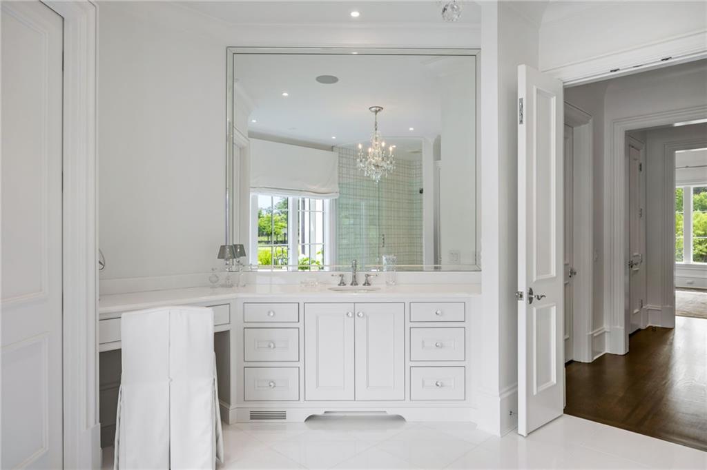 1640 Kenai Road Marietta, GA 30064 - Photo 23 of 43 a bathroom with a sink and a mirror