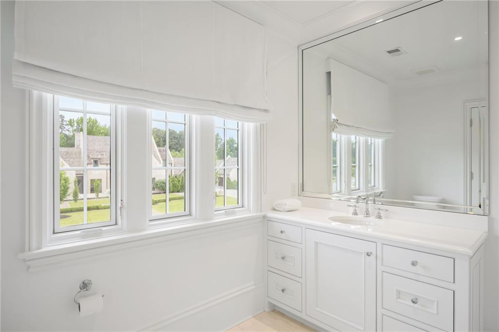 1640 Kenai Road Marietta, GA 30064 - Photo 30 of 43 a bathroom with a sink and a window