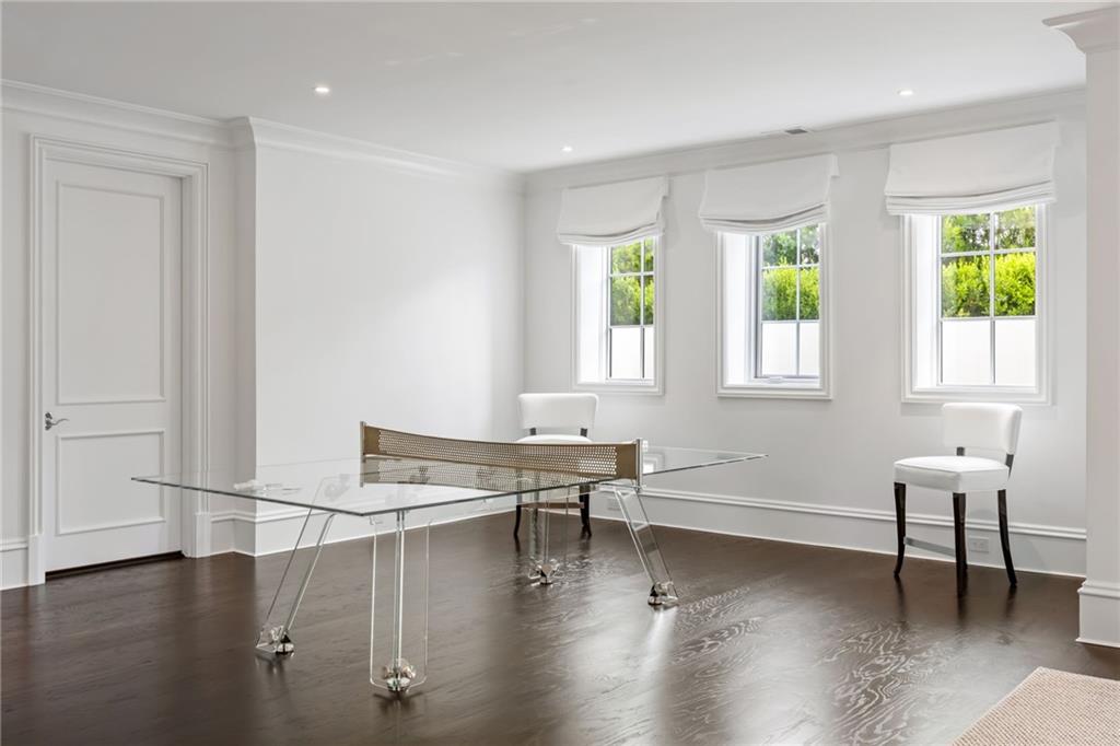 1640 Kenai Road Marietta, GA 30064 - Photo 35 of 43 a living room with furniture and a wooden floor