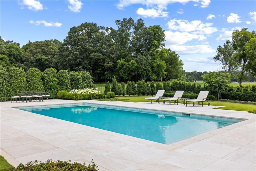 1640 Kenai Road Marietta, GA 30064 - Photo 39 of 43 a view of a swimming pool with a yard