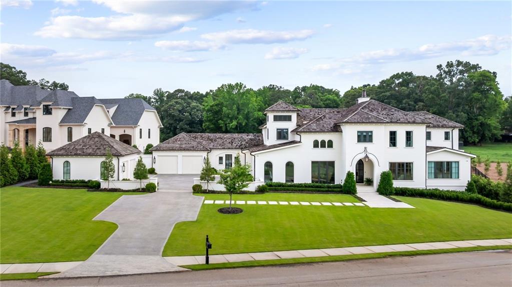 1640 Kenai Road Marietta, GA 30064 - Photo 42 of 43 a front view of a house with a garden