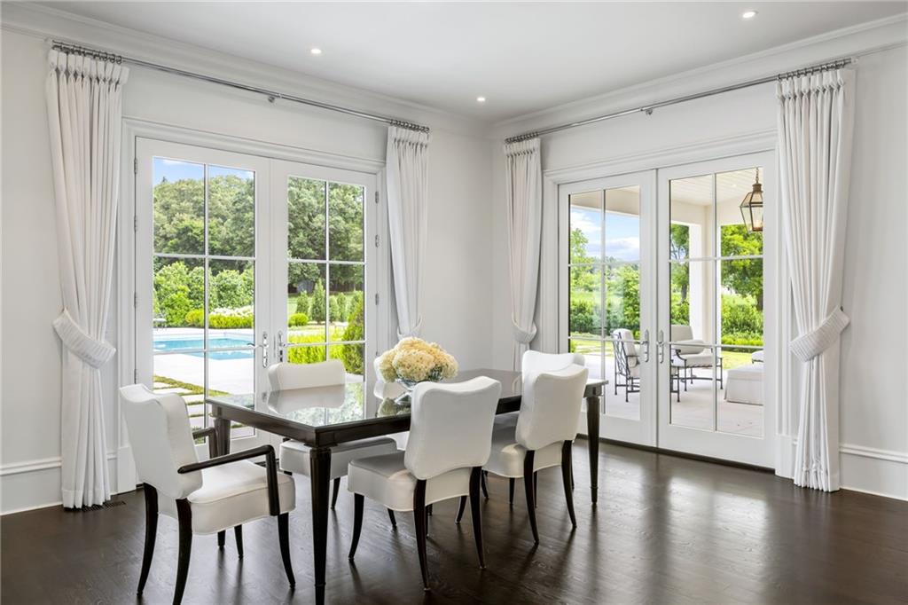 1640 Kenai Road Marietta, GA 30064 - Photo 6 of 43 a view of a dining room with furniture and wooden floor
