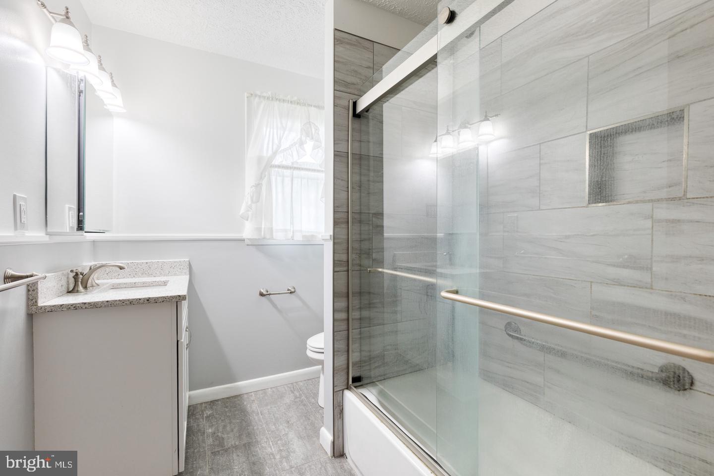 8306 Berkfield Road Baltimore, MD 21237 - Photo 16 of 29 Modern bathroom with sleek finishes.